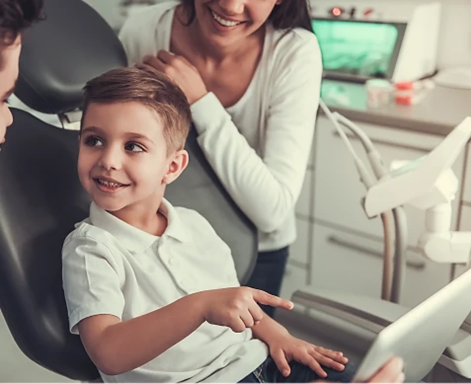 Rectangle 150 - Encino Gentle Dental - Encino Gentle Dental Child in the dental chair with a parent nearby